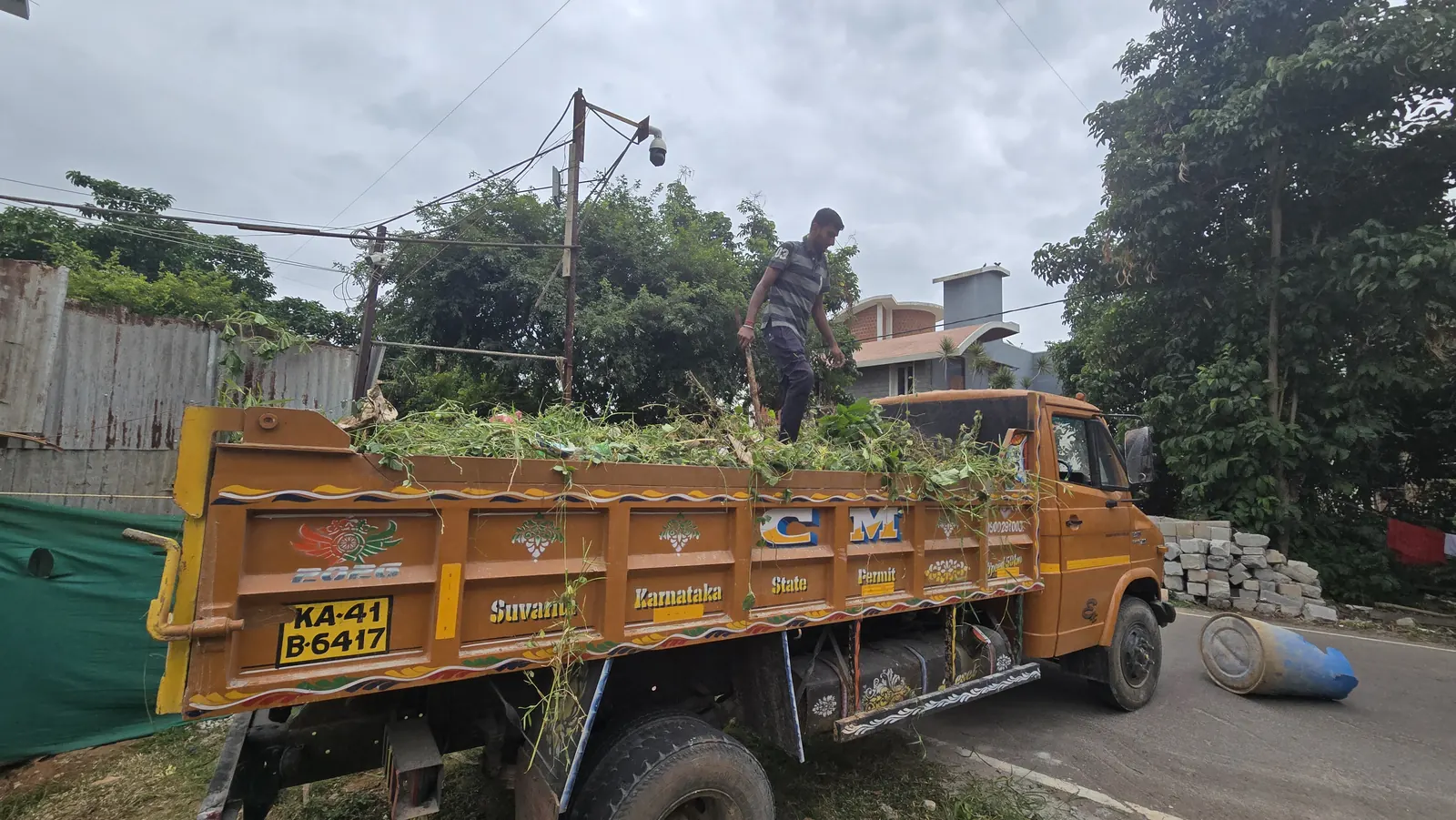 Green waste loaded and hauled away